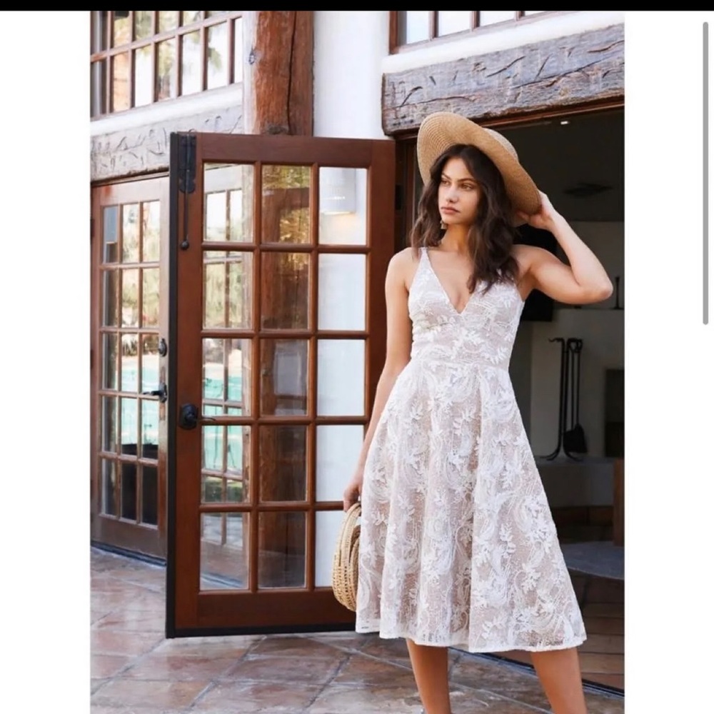 Dress The Population Elisa dress.  White with full nude lining.  Size Large.